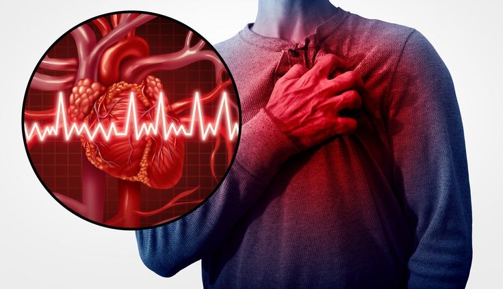 Fit young man experiencing chest discomfort despite an active lifestyle, highlighting hidden heart attack risks.
