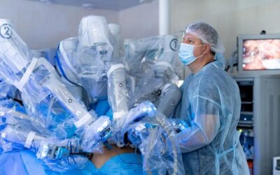 Cardiologist interacting with a holographic 3D heart model using augmented reality technology in a modern cardiac catheterization laboratory