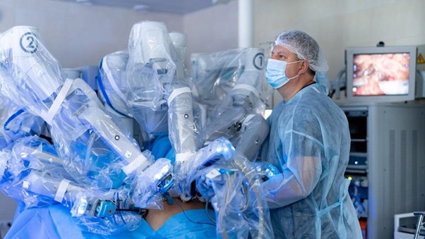 Cardiologist interacting with a holographic 3D heart model using augmented reality technology in a modern cardiac catheterization laboratory