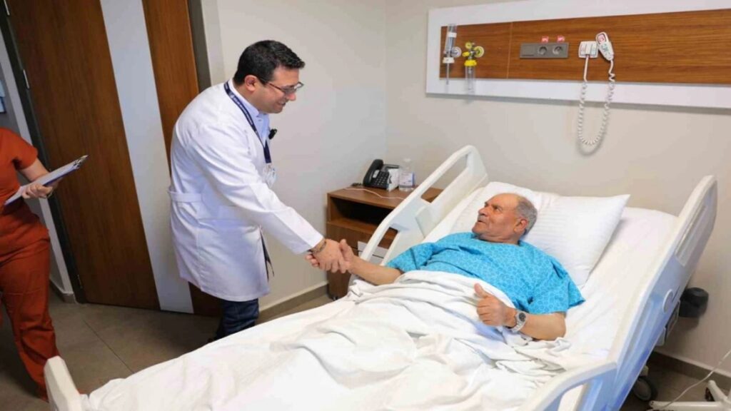 Cardiologist reviewing TMT stress test results with a middle-aged patient after a treadmill heart assessment in Navi Mumbai